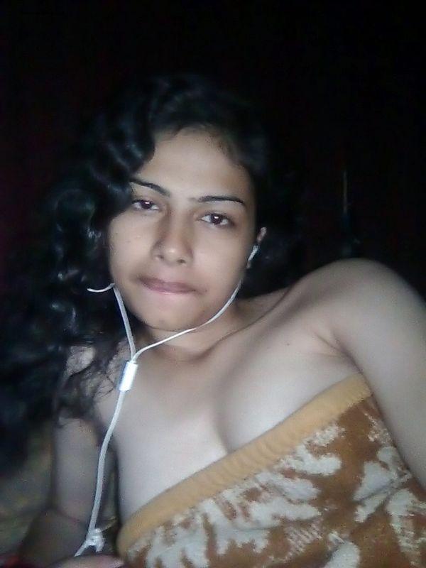 Indian wife listens to music while setting her natural tits free(6)