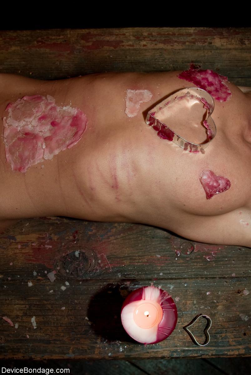 A gagged and restrained Cecilia Vegais is covered in heart shaped wax(16)