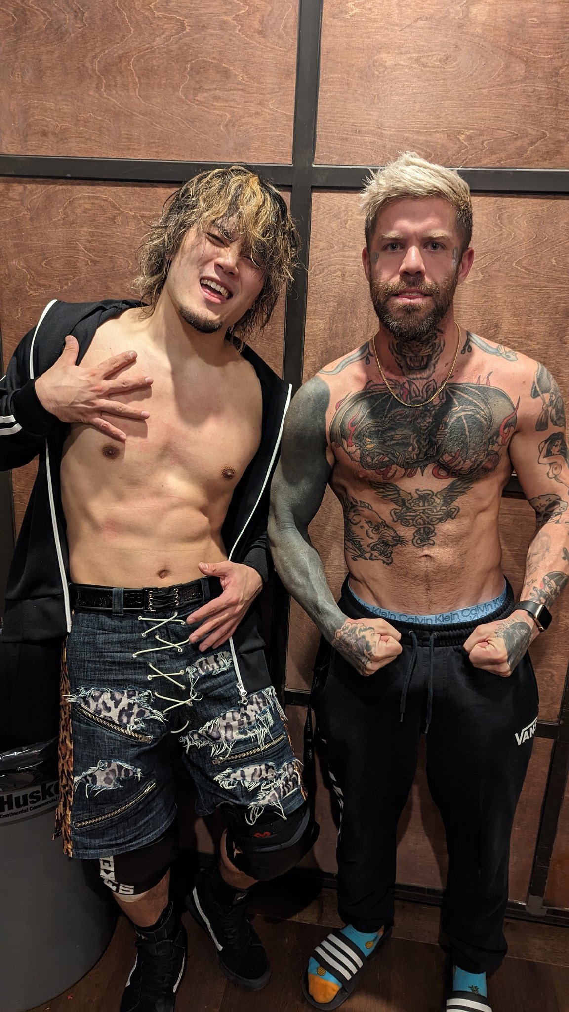 Pro Wrestlers MAO and Kevin Blackwood posing next to eachother.