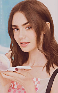 Lily Collins - Page 7 GToVM4N0_o