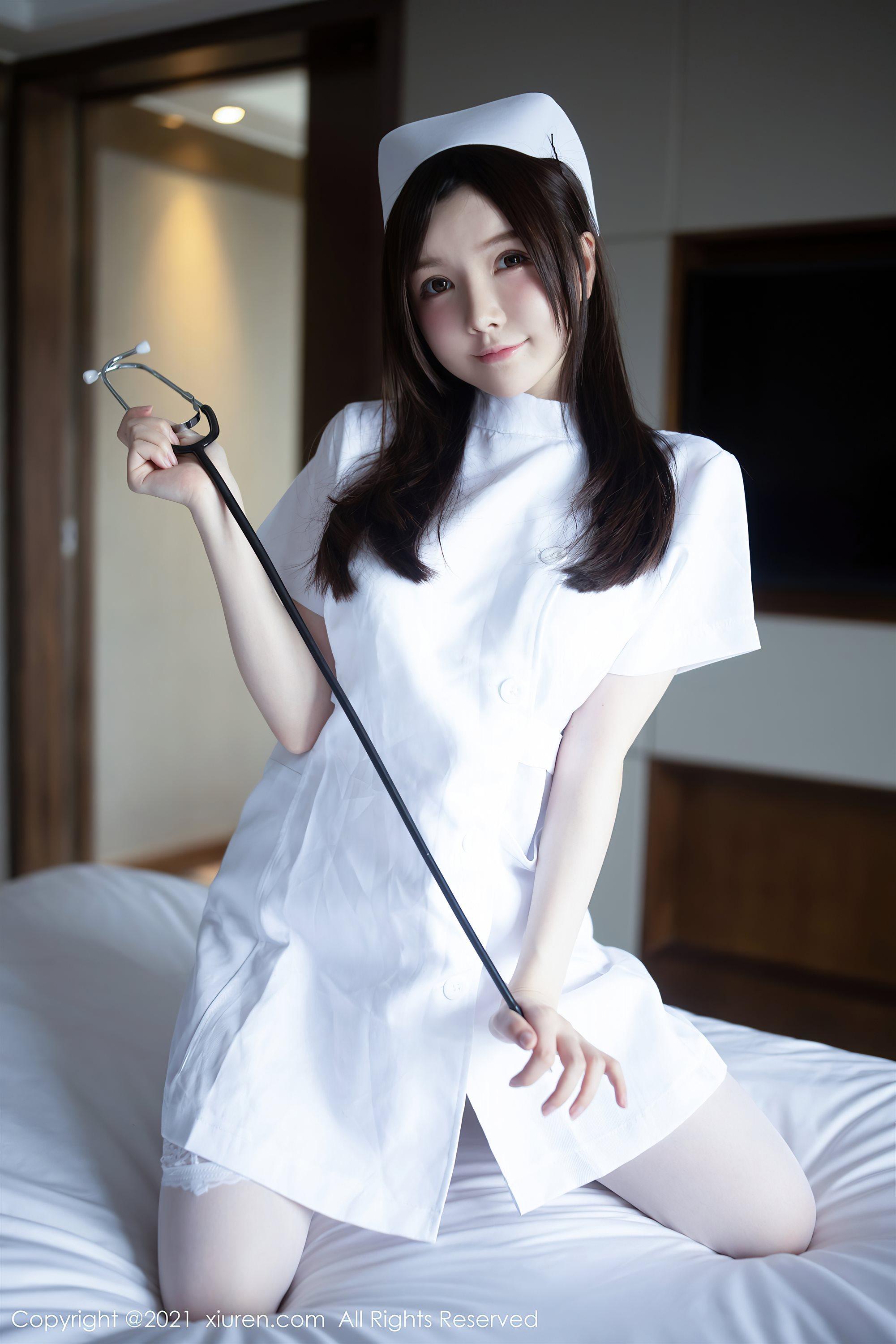 [XiuRen秀人网]No.3114 女神糯美子Mini洁白护士制服主题私房蕾丝内衣秀豪乳翘臀诱惑写真(8)