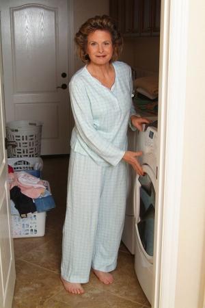 Horny mature Judy doffs her pajamas and reveals her natural tits & hairy twat