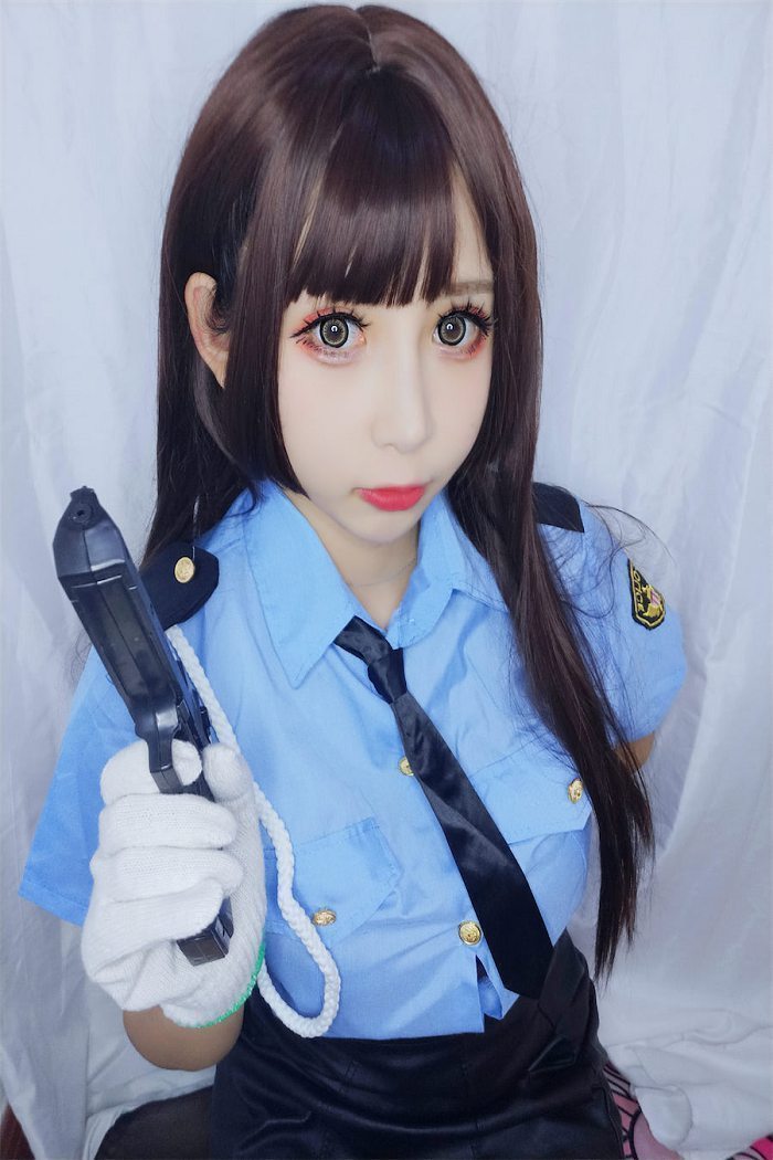 w黑米粥w 蓝色制服女警写真(13)