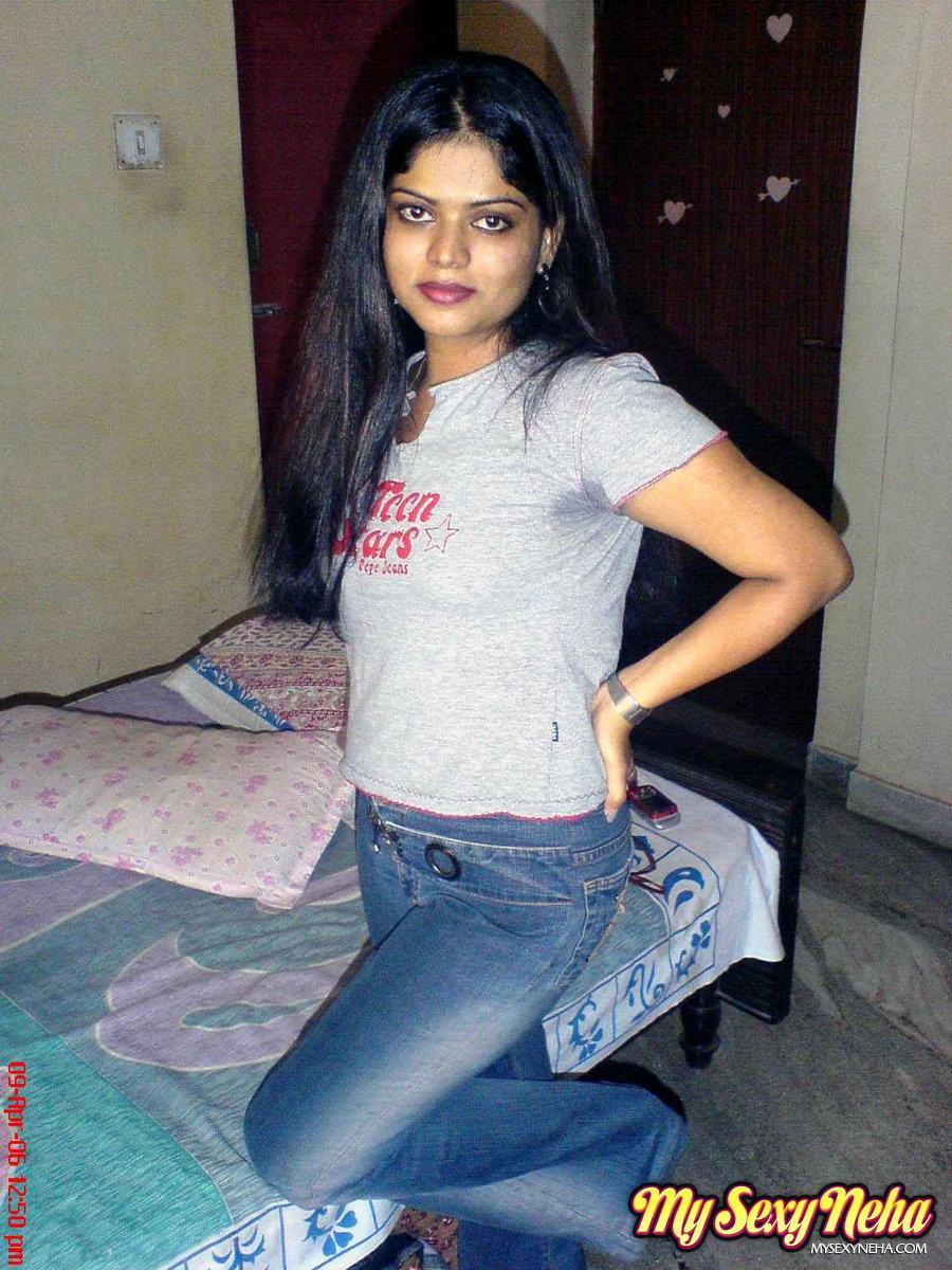 Petite Indian girl uncups big naturals after removing blue jeans(4)