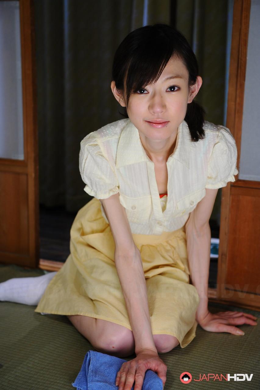 Young looking Japanese girl Aoba Itou changes into a sheer teddy(3)