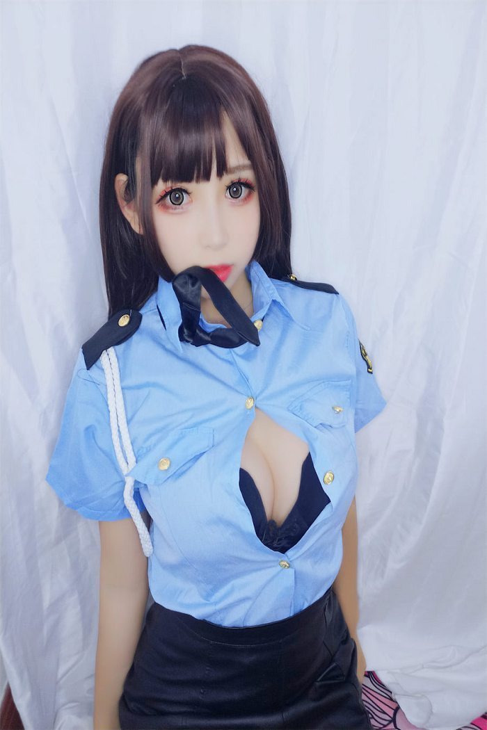 w黑米粥w 蓝色制服女警写真(5)