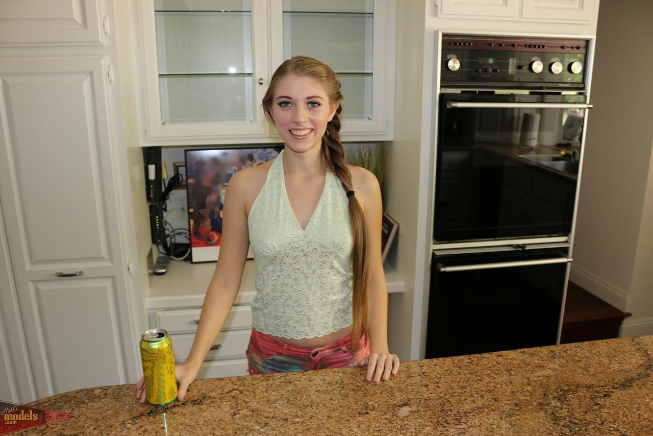 First timer Alyce Anderson gets naked on kitchen counter to part her pussy(1)