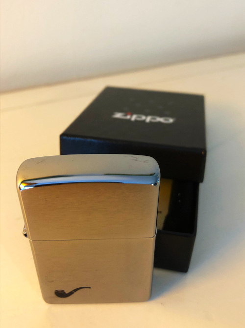 zippo lighter, tobacco pipe