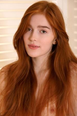 Redheaded teen Jia Lissa rubs her love holes after exposing her tiny tits