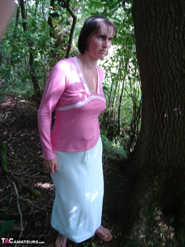 Older woman Slut Scot Susan gives a blowjob in the woods after baring her ass(2)