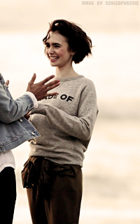 Lily Collins - Page 2 6CRxV2Am_o
