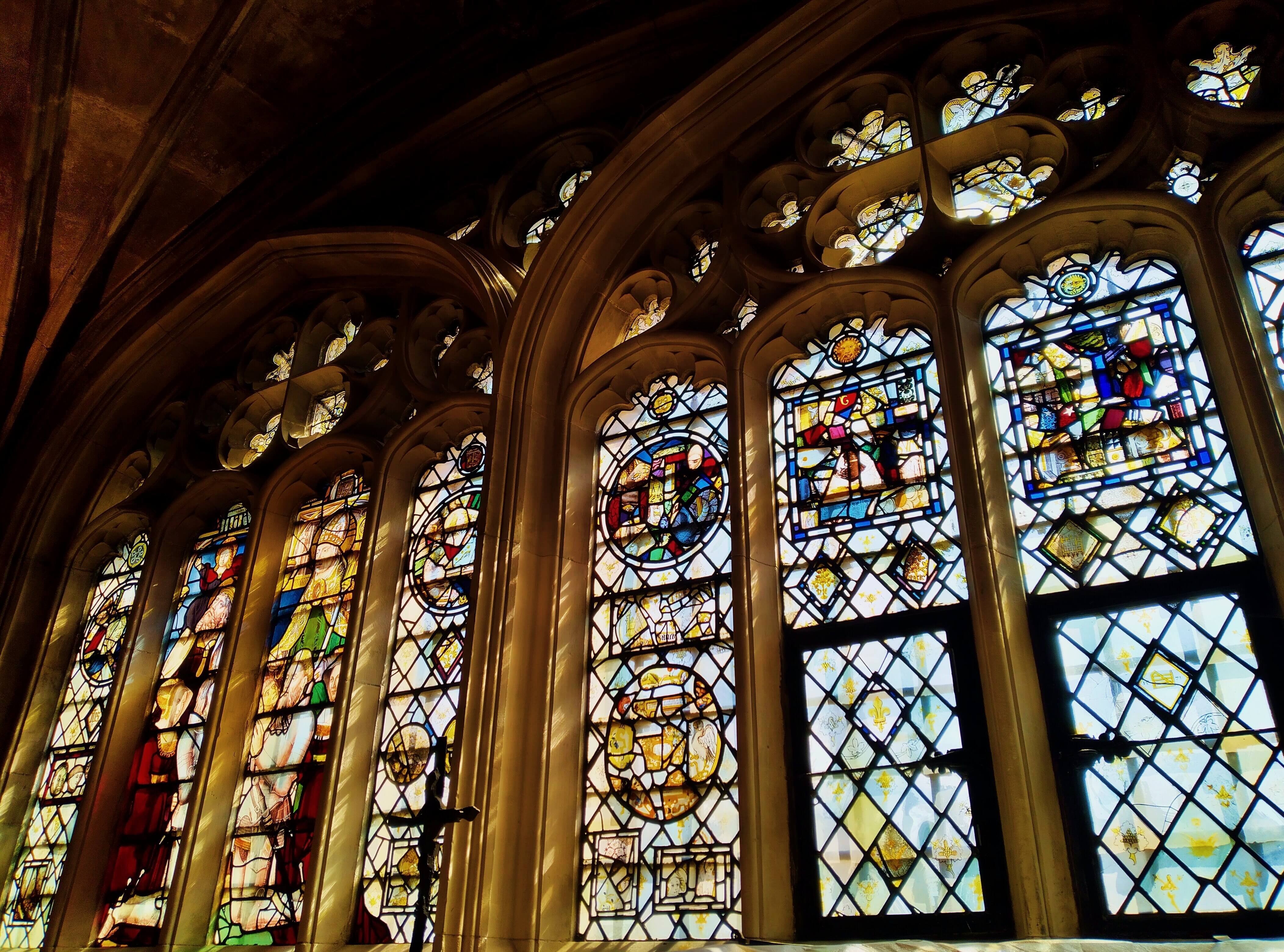 Two arched stained glass windows