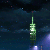 A radio tower at night.