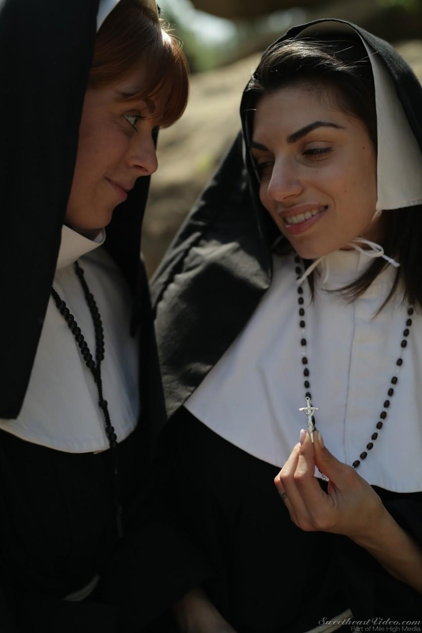 Sinful nuns with juicy boobs Penny Pax & Darcie Dolce lick each other's cunts(7)