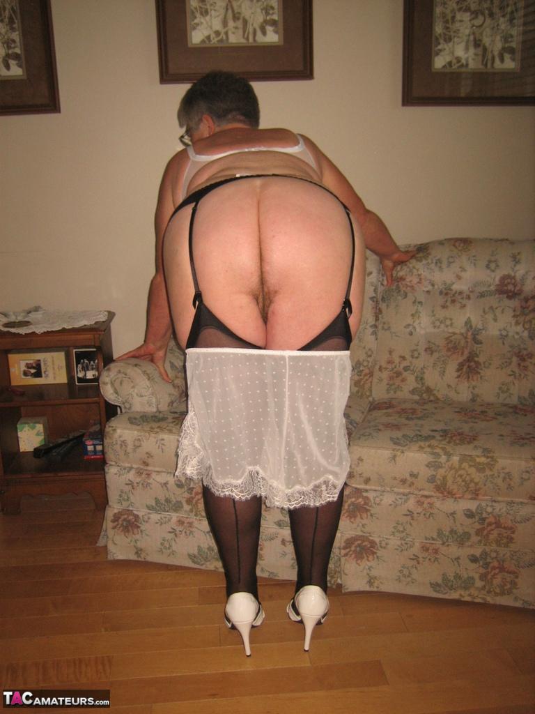 Fat old woman Girdle Goddess slips underwear over her big ass in nylons(12)