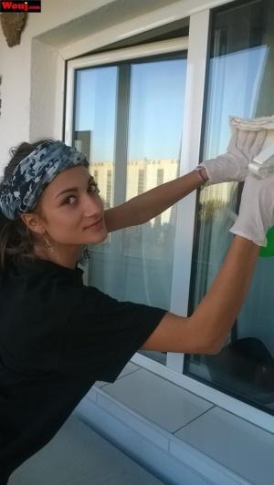 Sexy housewife WouJ flaunts her big booty while cleaning the windows outdoors