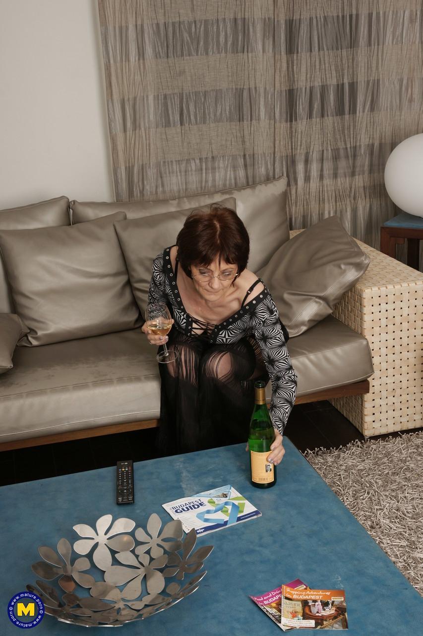 Mature European GILF drinks champagne after a hot solo masturbation session(3)