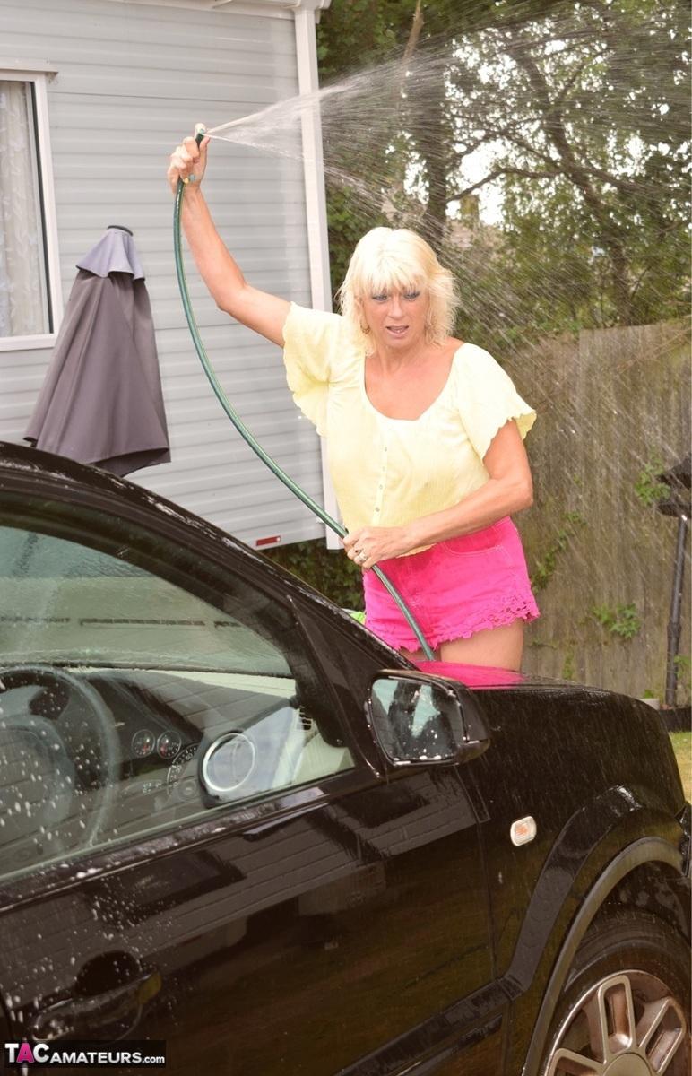 Older blonde Dimonty gets totally naked after washing a vehicle(7)