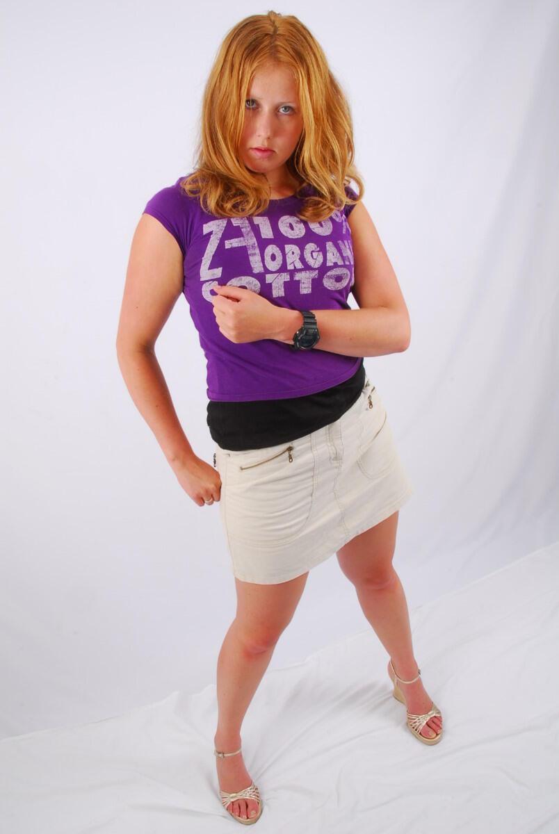 Natural redhead Judy models a black G-Shock watch while fully clothed(15)