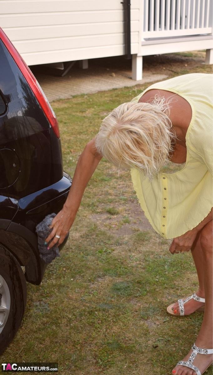 Older blonde Dimonty gets totally naked after washing a vehicle(1)