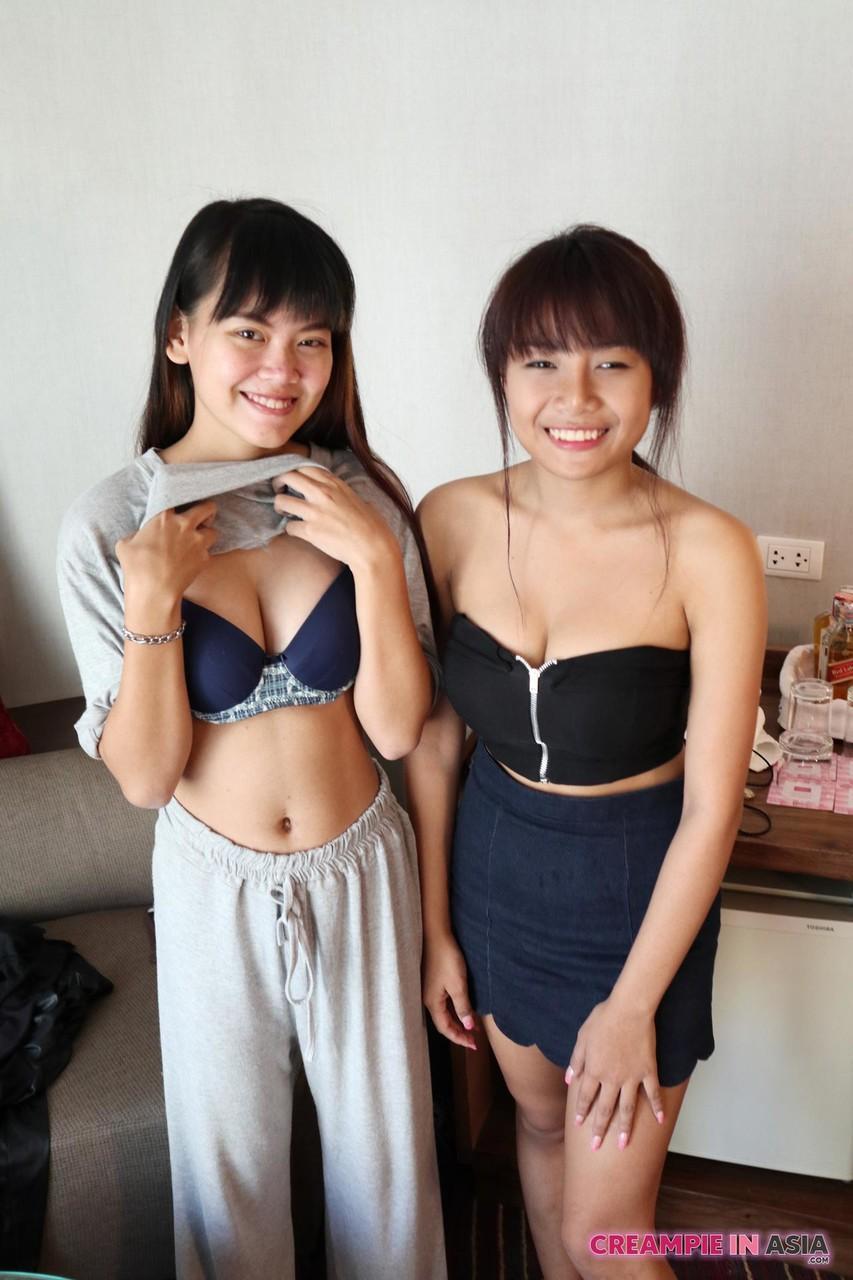 Petite Asian amateurs Sprite and Mon strip and pose naked together(4)