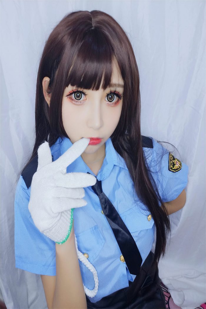 w黑米粥w 蓝色制服女警写真(8)