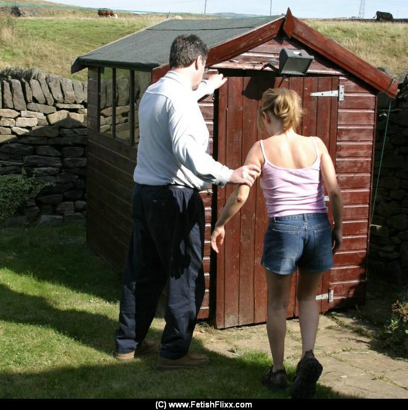 Caucasian girl is taken into a shed for a much-needed spanking(2)