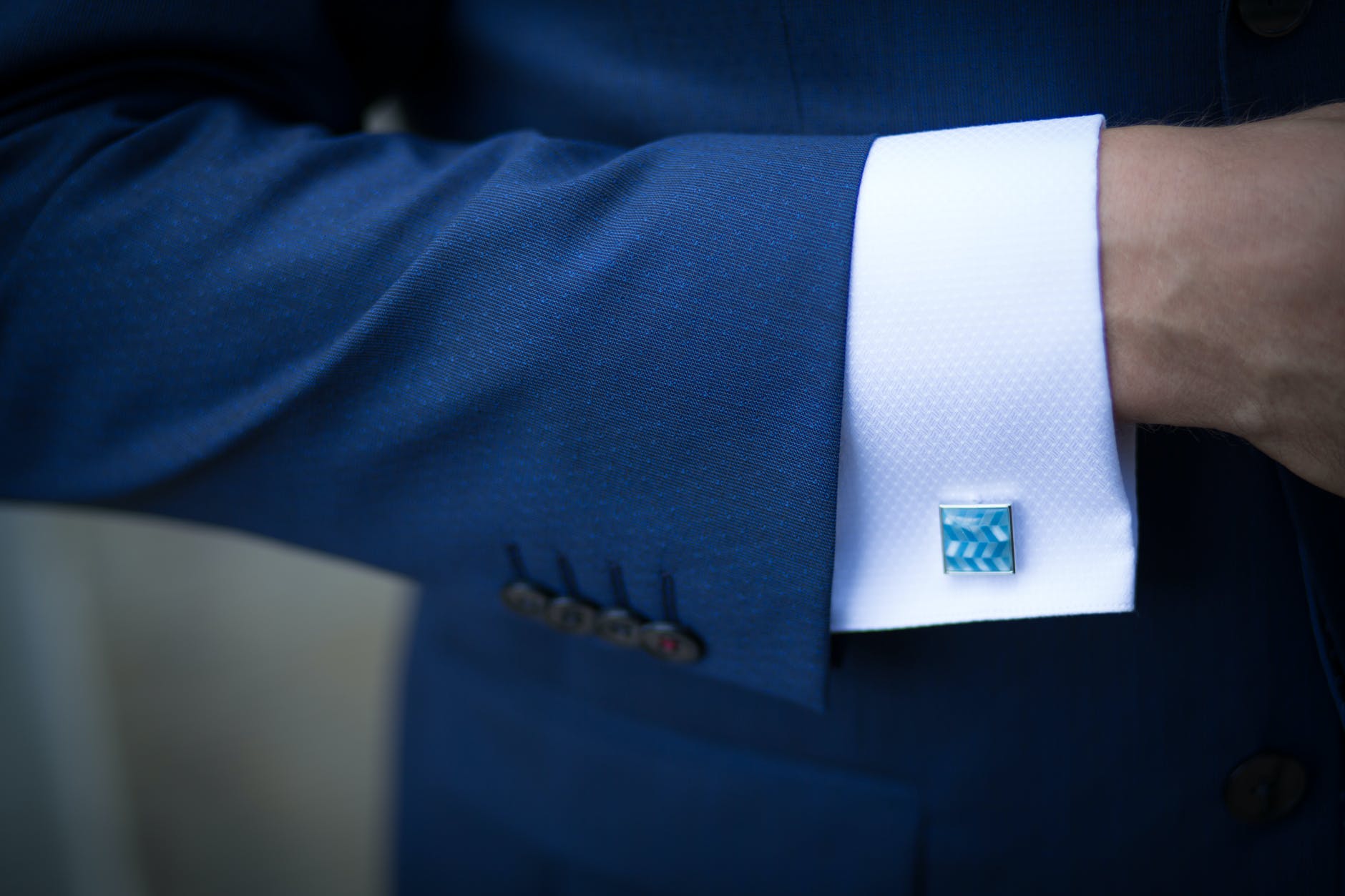 Close-up shot of man wearing blue suit