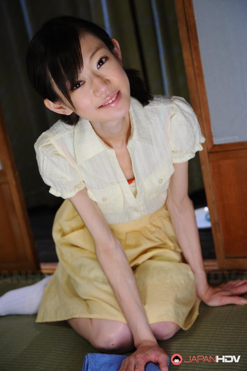 Young looking Japanese girl Aoba Itou changes into a sheer teddy(4)