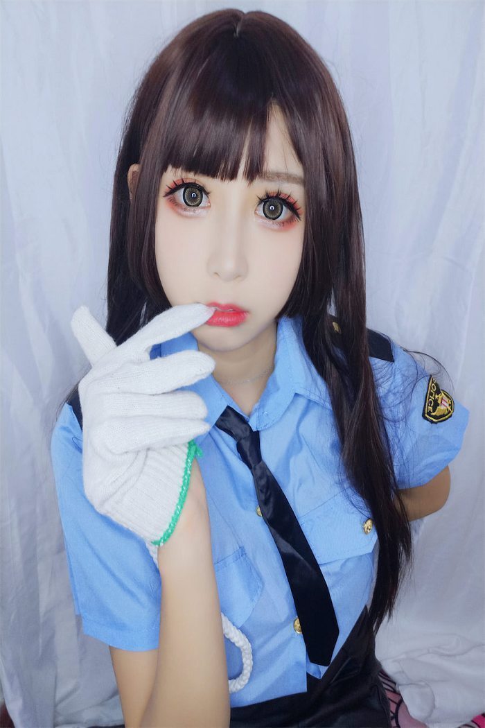 w黑米粥w 蓝色制服女警写真(1)