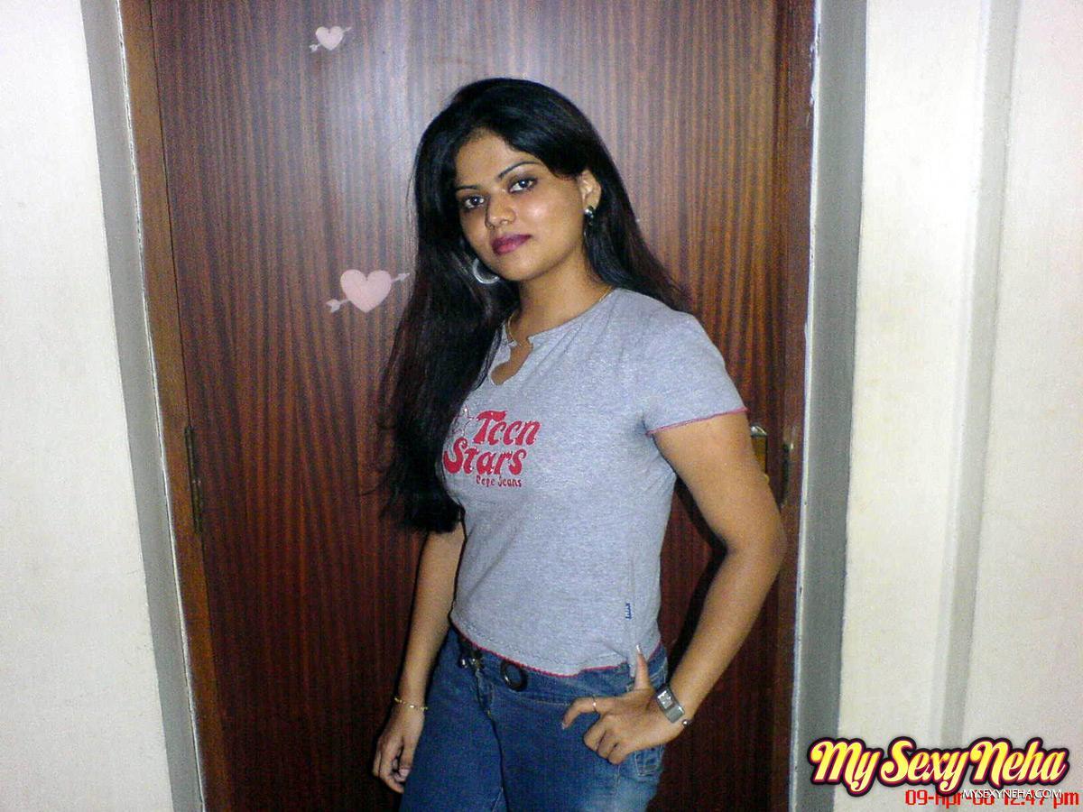 Petite Indian girl uncups big naturals after removing blue jeans(3)