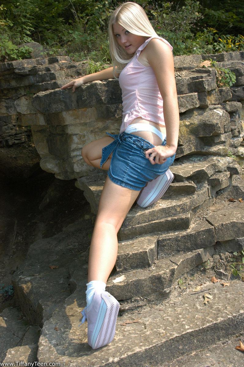 Charming blonde teen Tiffany hikes skirt over cotton panties in the forest(9)