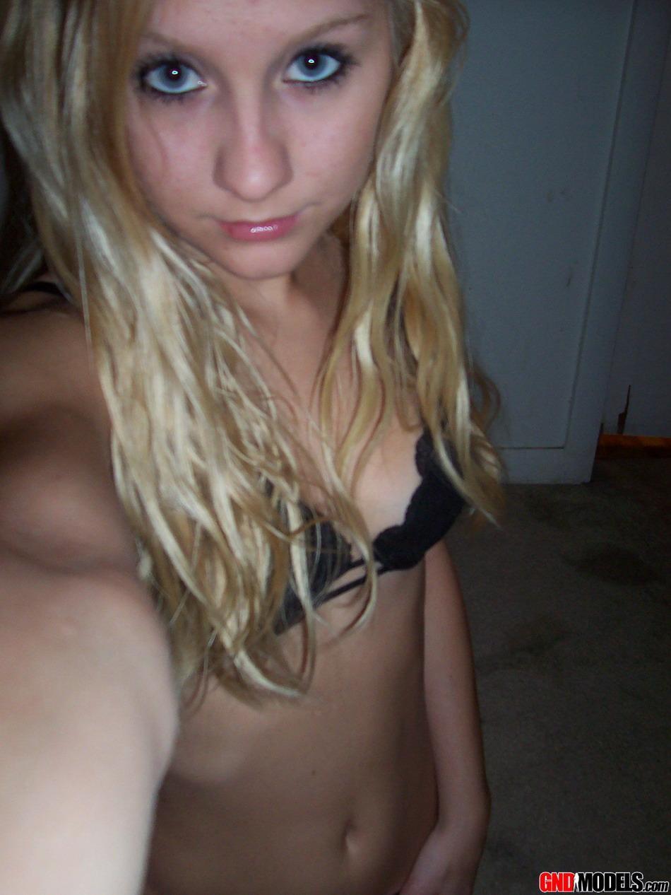 Blonde amateur Kylie takes mirror selfies while disrobing to her bra and thong(7)