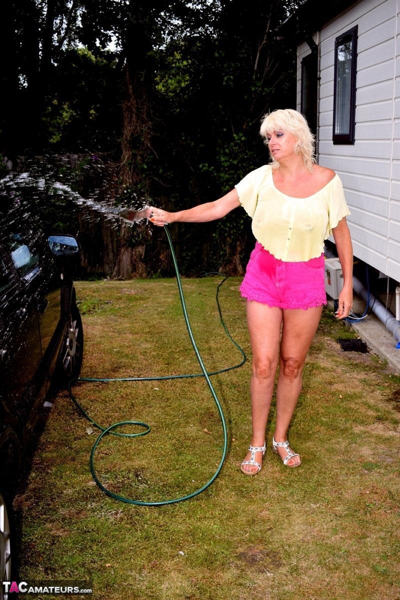 Older blonde Dimonty gets totally naked after washing a vehicle(2)