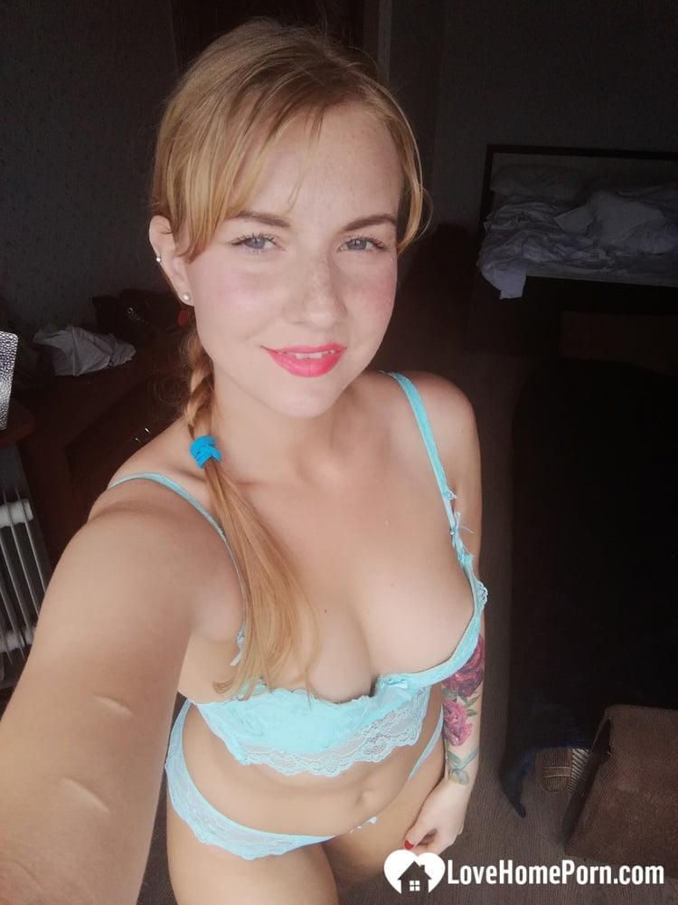 Beautiful amateur doll takes selfies while posing in her turquoise lingerie(8)