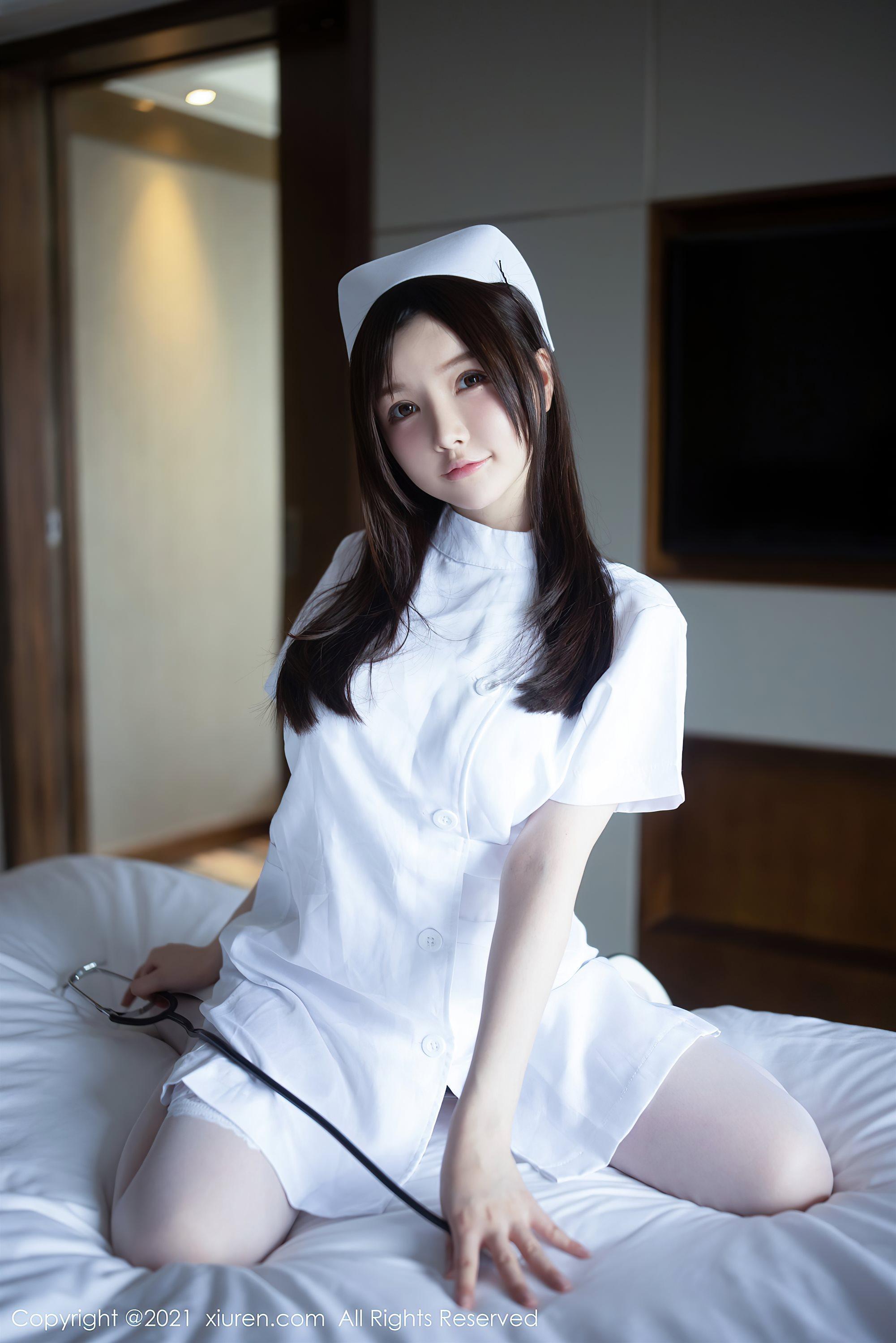 [XiuRen秀人网]No.3114 女神糯美子Mini洁白护士制服主题私房蕾丝内衣秀豪乳翘臀诱惑写真(9)