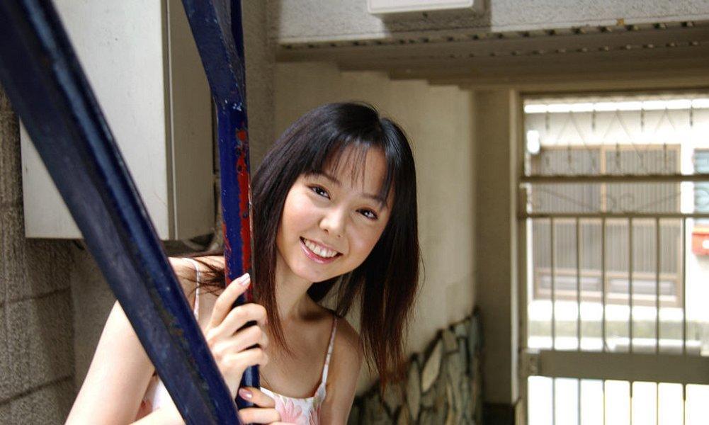 Sweet Japanese teen Yui Hasumi wears a smile while showing her hairy bush(1)