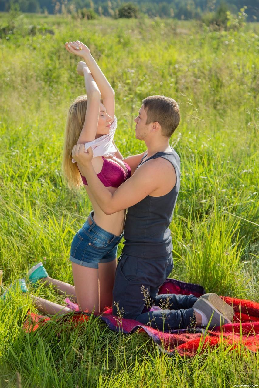 Hot blonde teen gets her bald twat hammered outdoors in a field(4)