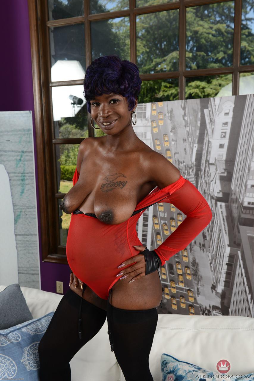 Pregnant ebony in nylons Tiana Grey unveils her hanging tits & her hairy pussy(5)