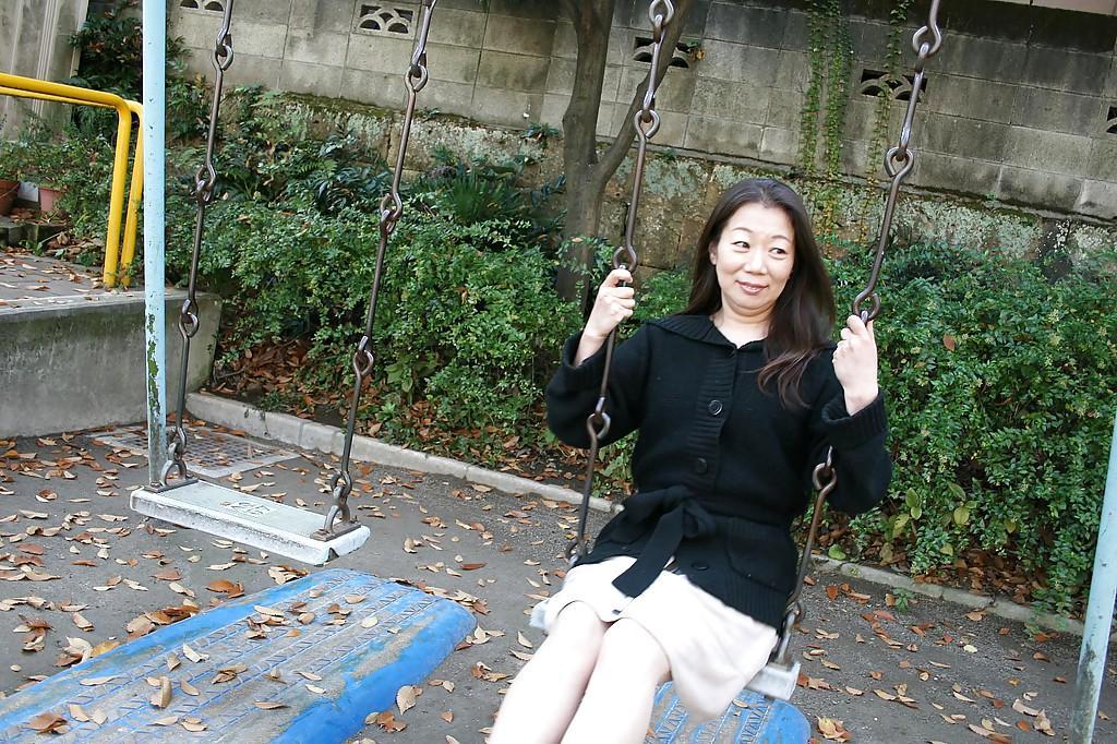 Outdoor posing scene featuring horny Asian mature Yoshiko Makihara(9)