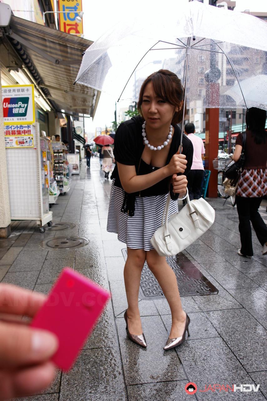 Pretty Japanese chick Ryo Akanishi shows some leg and cleavage while in public(14)