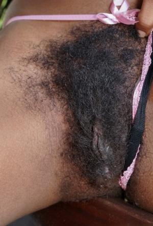 Black amateur Sofia Cuty unveils her sagging tits before showing her beaver