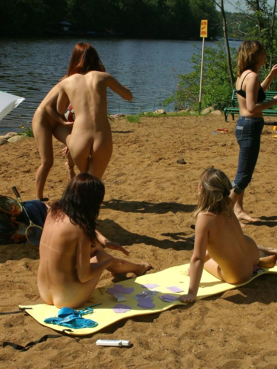 Naughty skinny babes show off their small tits outdoors while naked(6)