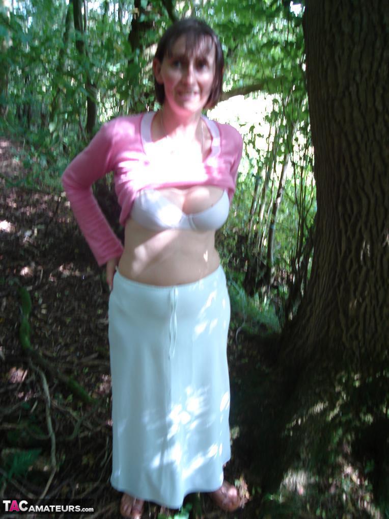 Older woman Slut Scot Susan gives a blowjob in the woods after baring her ass(3)