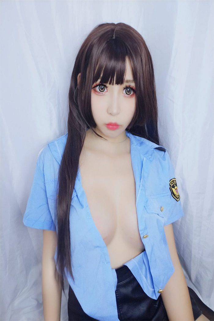 w黑米粥w 蓝色制服女警写真(6)