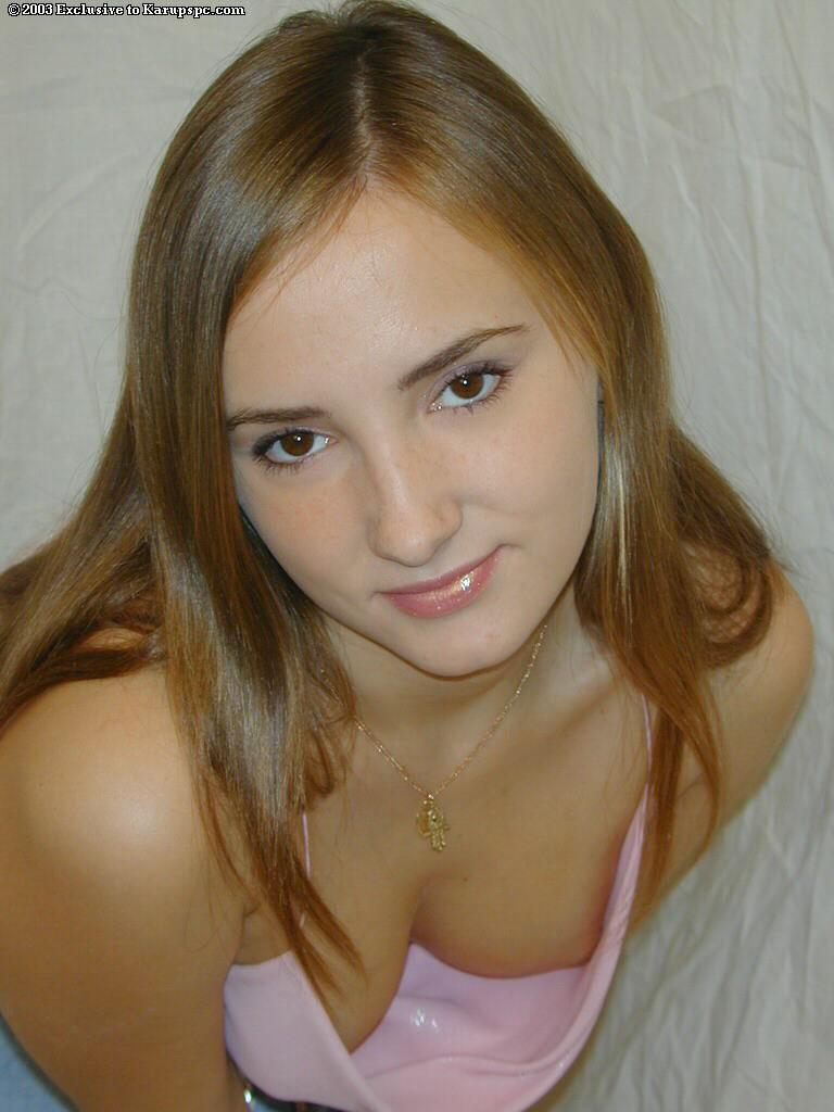 Slender amateur girl Olga is filmed from upskirt in her room(2)