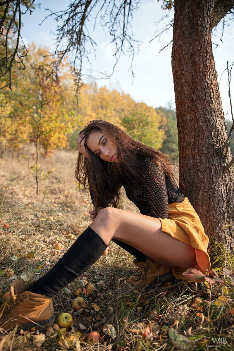 Glam model Sabrisse shows landing strip pussy in black knee socks under a tree(1)