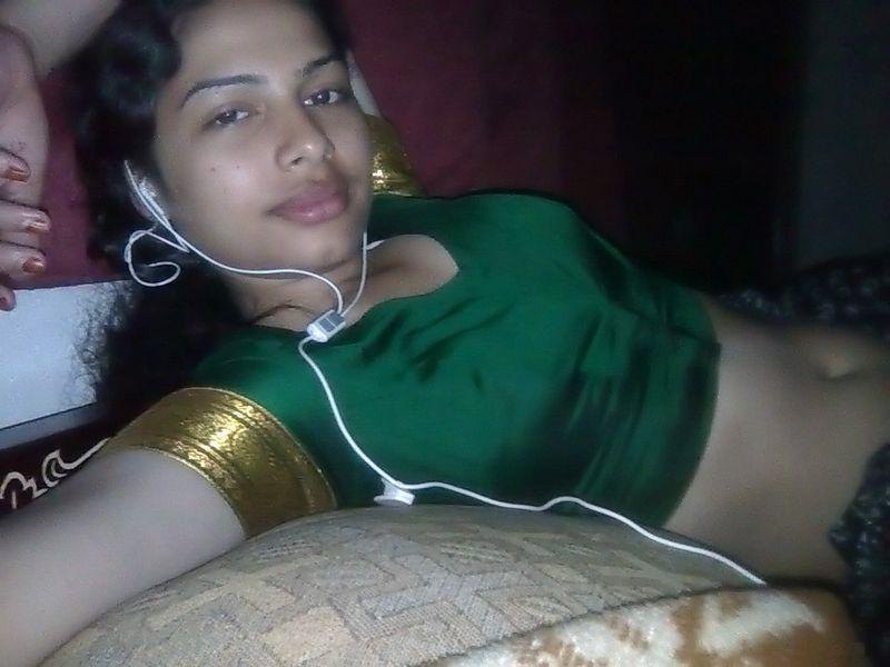 Indian wife listens to music while setting her natural tits free(2)