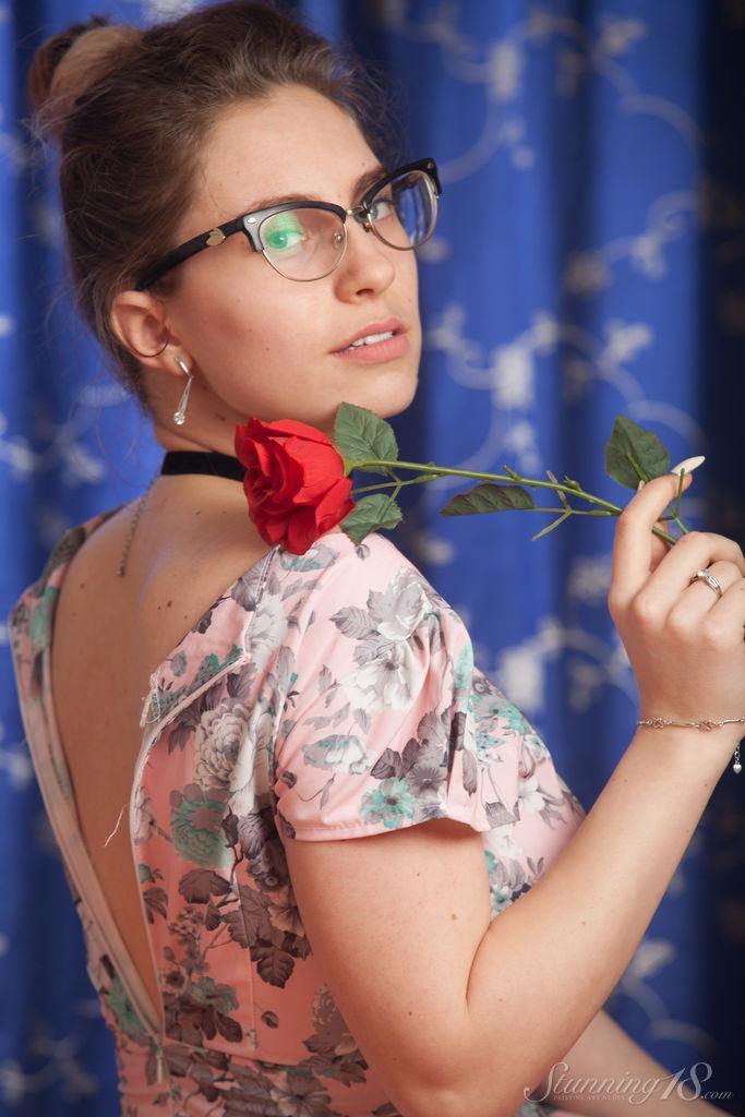 Nerdy 18 year old Liza Loo holds a rose showing her firm breasts in glasses(4)