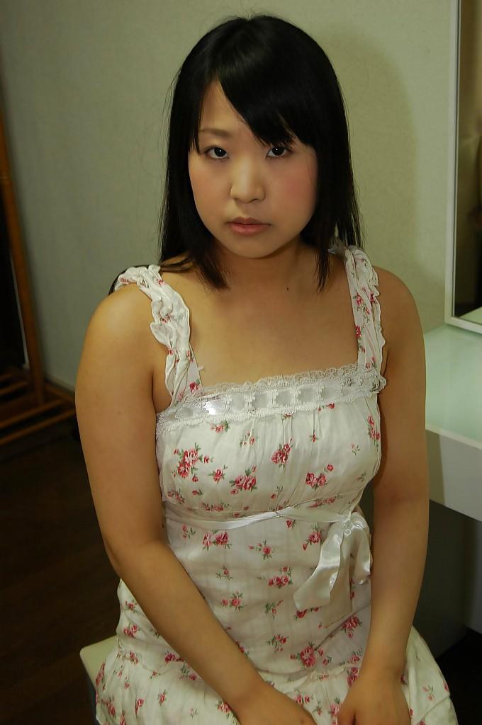 Shy asian teen Jun Matsuzaki stripping down and playing with a vibrator(2)